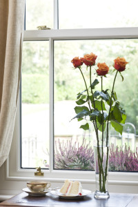 White timber sliding sash window by Anglian Home Improvements myglazing ggf