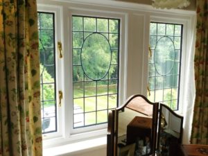 Edwardian leaded windows encapsulated in bespoke hardwood frames