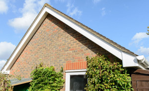 Gable end of property featuring white uPVC fascia and bargeboard by Anglian Home Improvements myglazing ggf