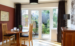 Dining room featuring white French doors by Anglian Home Improvements myglazing ggf