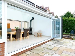 open bifold doors on modern conservatory