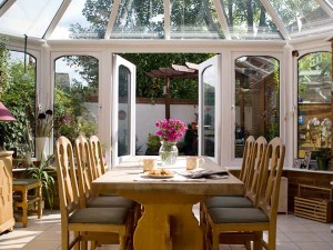 dining room conservatory with open french doors