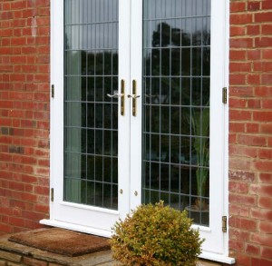 white french doors with lead lined glass panes