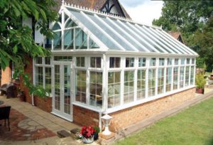 gable fronted conservatory french doors trees lawn