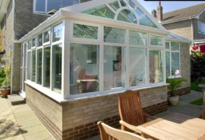 gable fronted conservatory leaded windows brick base