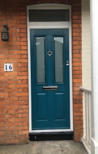 Dark blue front door with silver knocker