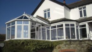 Glazed conservatory extension with full length windows