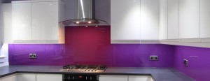 Kitchen countertop with purple splashback