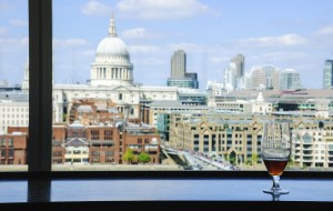 view across river thames to st pauls cathedral in london