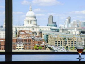 view of st pauls in london with glass in foreground